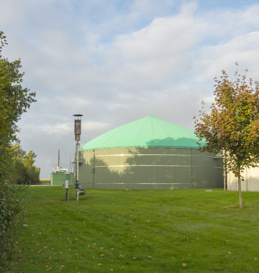 tranquil-scenery-biogas-buildings-field-min